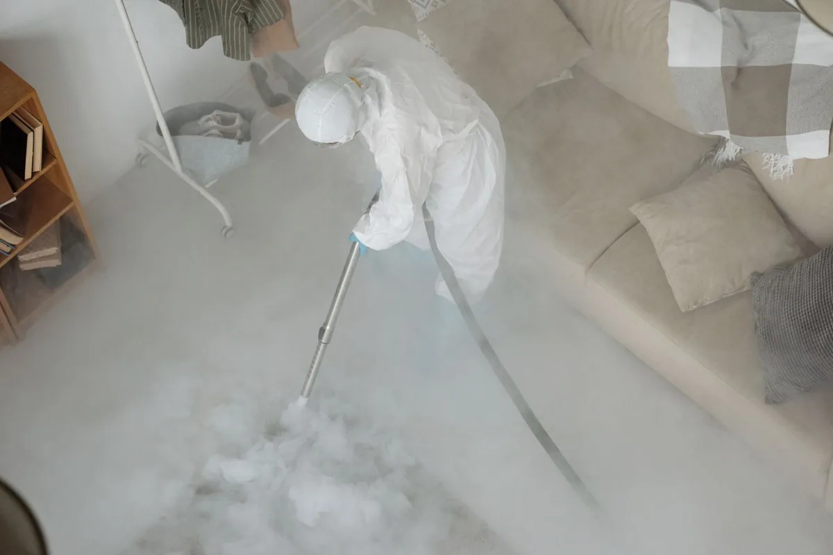 Biohazard cleanup technician in protective equipment, Snead, AL
